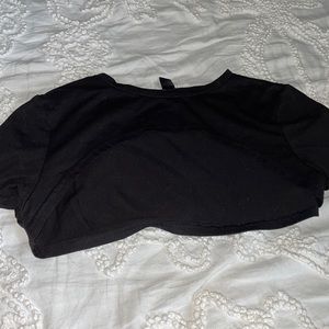 This is a black cover up that u can wear with tanks and sports brawls